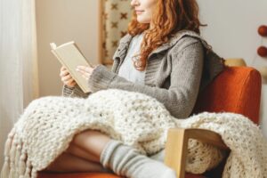 woman reading before bed