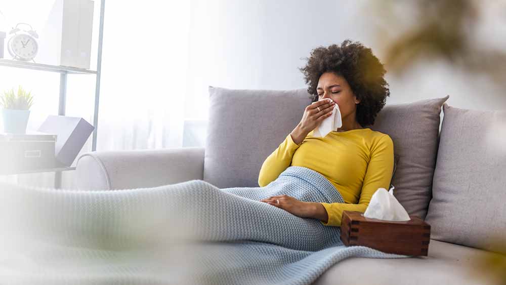 woman-with-frequent-cold-on-sofa-betteryou-anxious.jpg